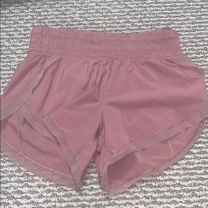 Light pink lulu lemon athletic shorts